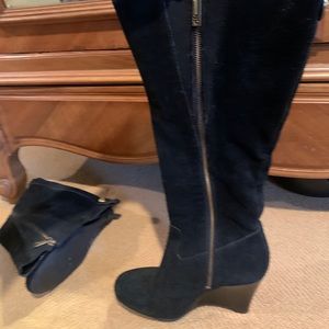 Tory Burch black suede boots.